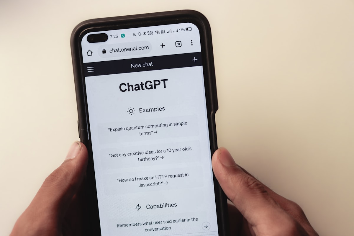 A person chatting with an AI assistant on their phone