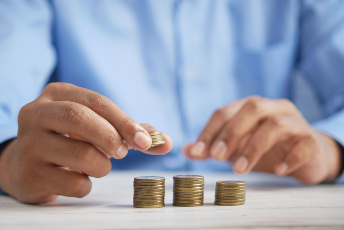 Coins being stacked, representing personal budgeting and finance
